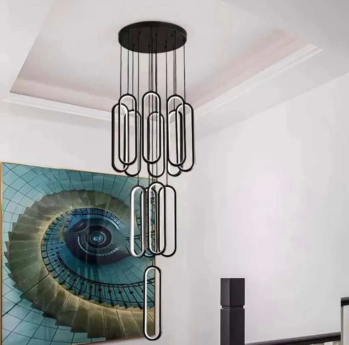 Black long staircase pendant light for high ceilings