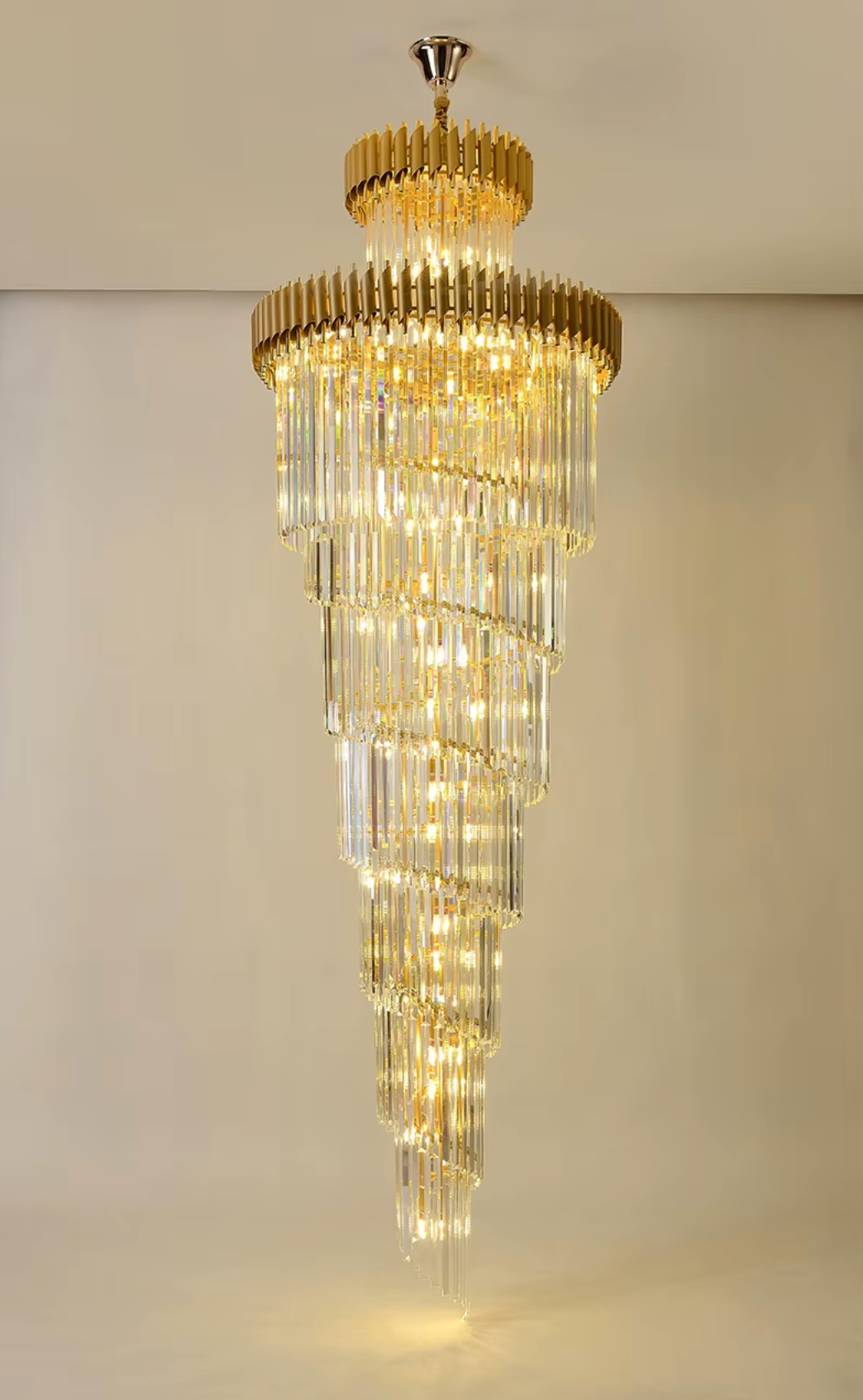 Gold cascading crystal chandelier for high ceilings