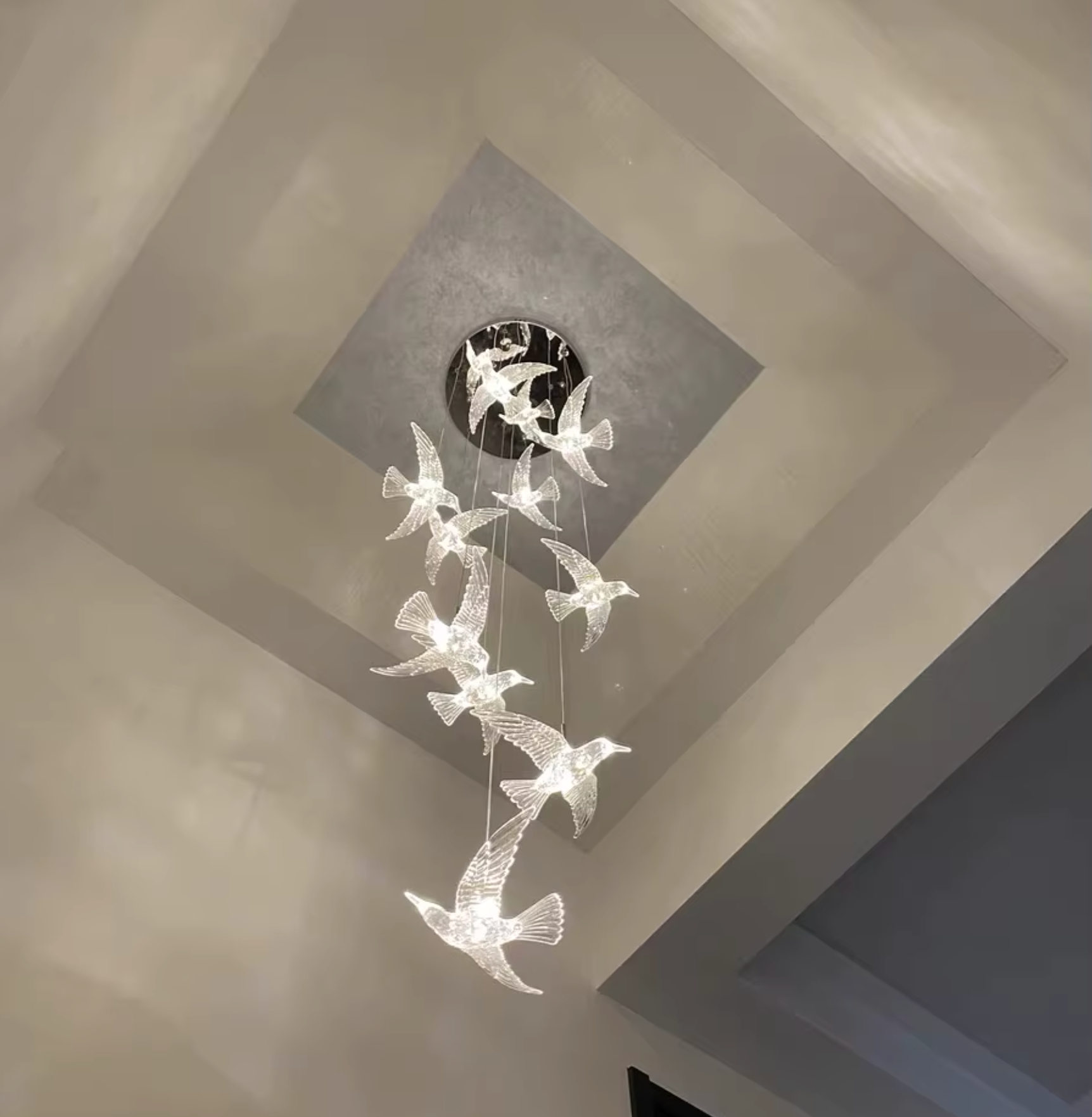 modern pendant for staircase with birds 