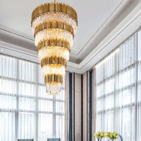 Gold chandelier over staircase