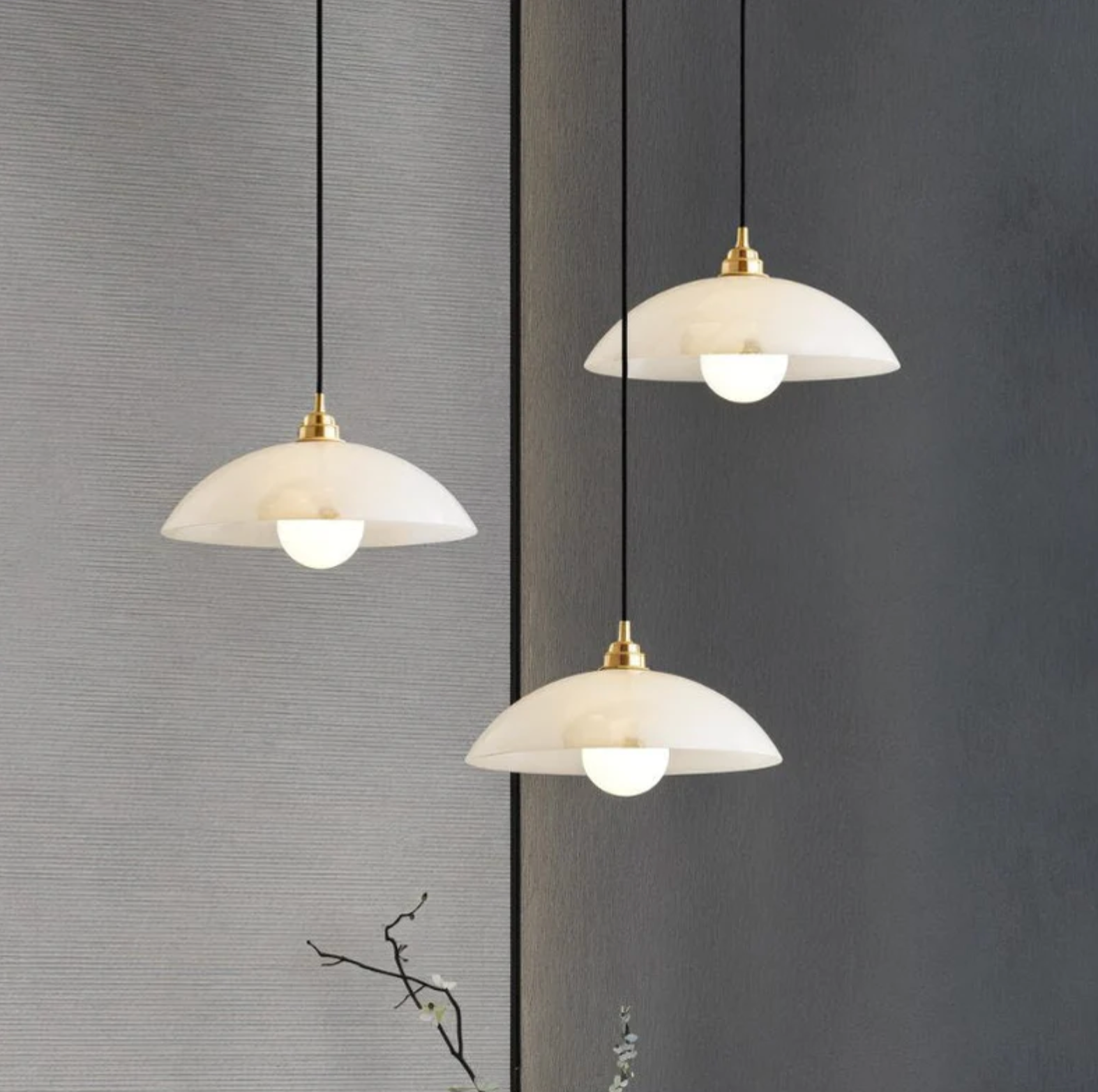 White Marble Pendant Lights Hanging Over Dining Table