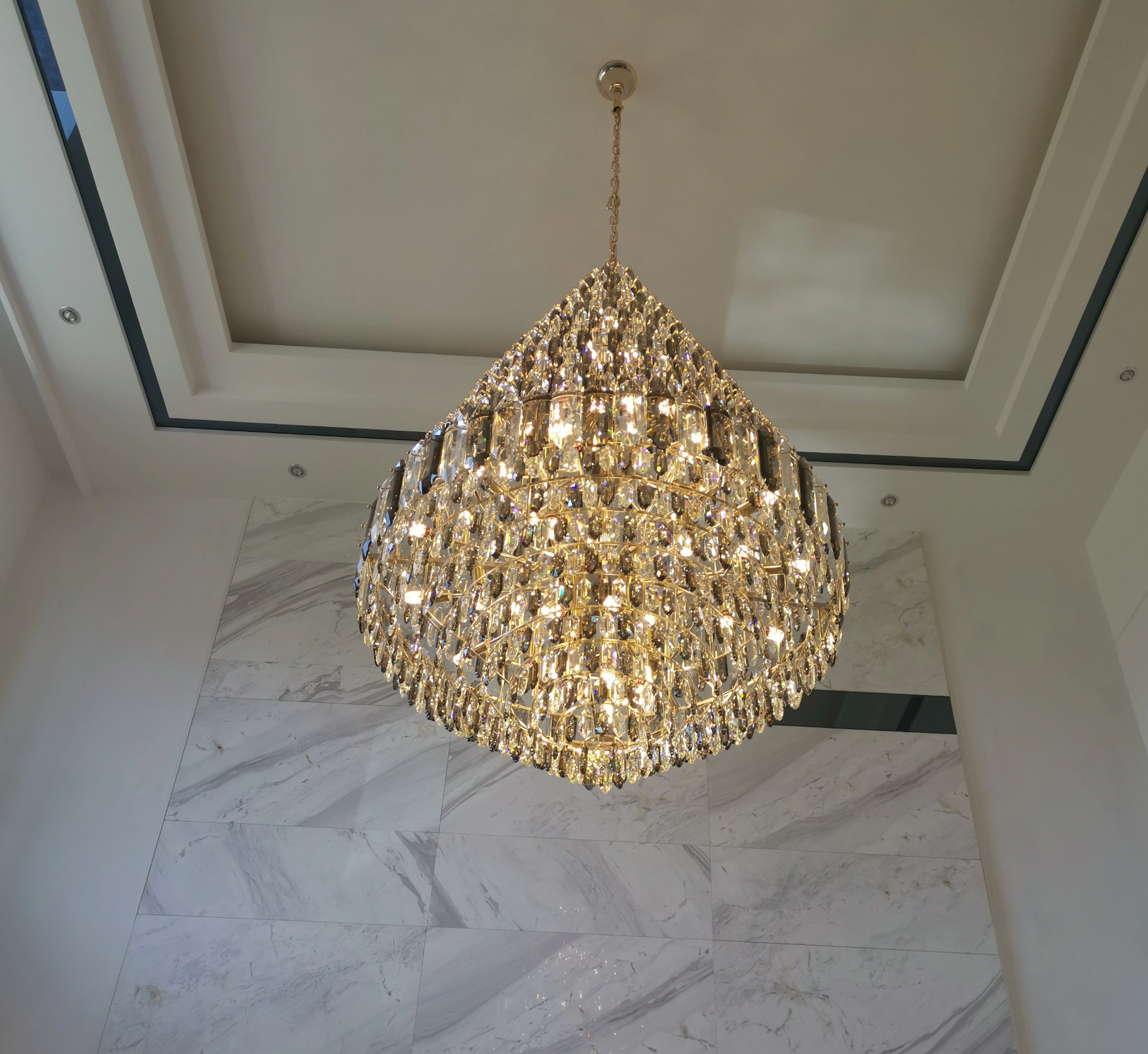 Smoke grey chandelier suited for the staircase