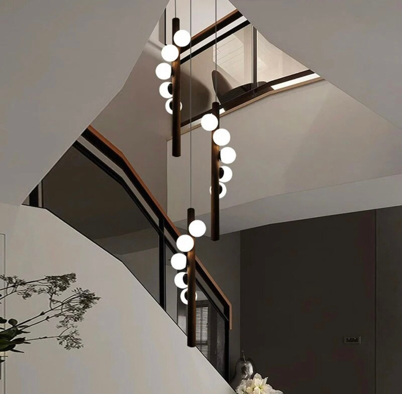 Artistic spiral ball light enhancing staircase decor with style