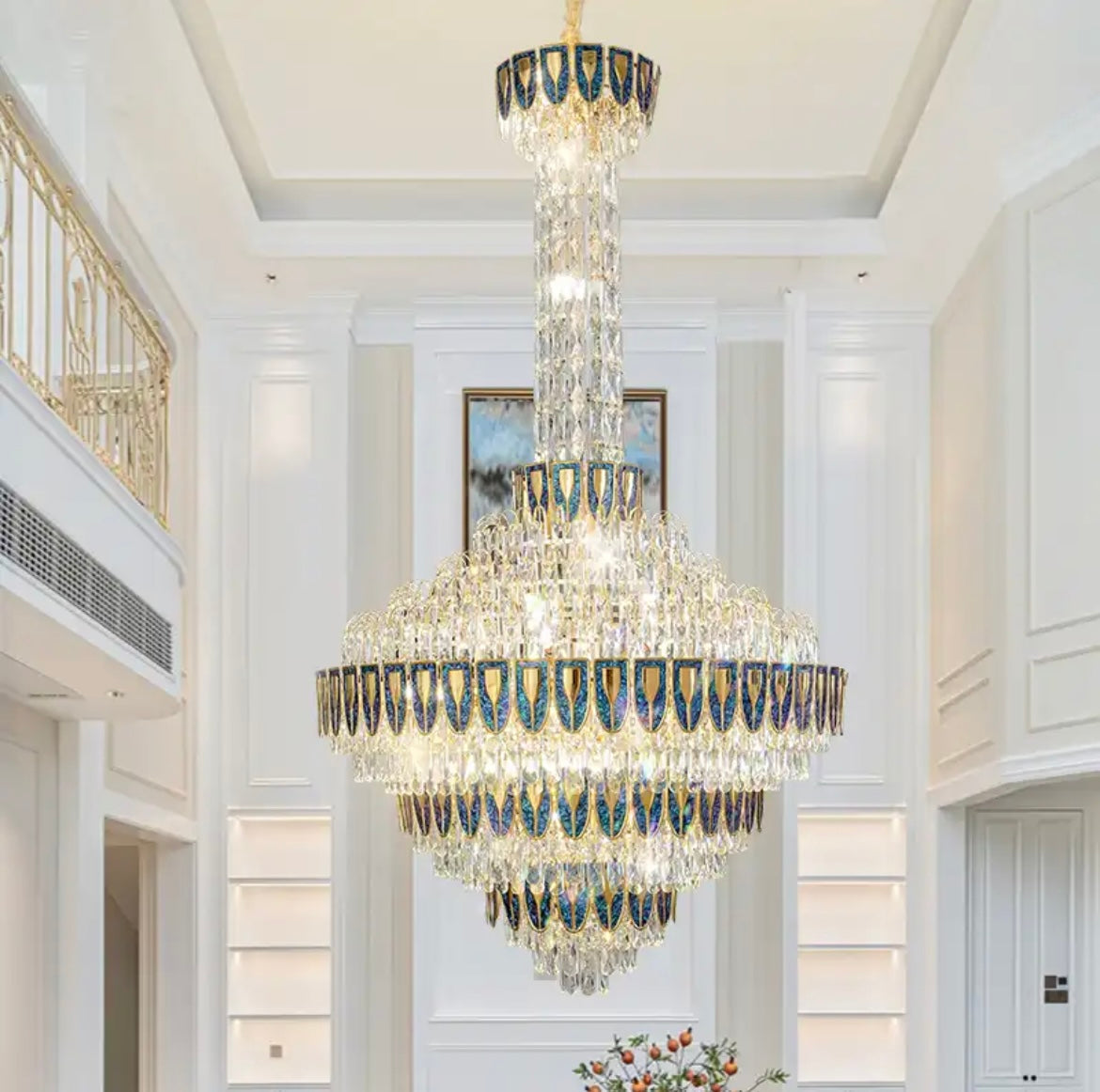 Chandelier with clear and blue glass elements in a slim