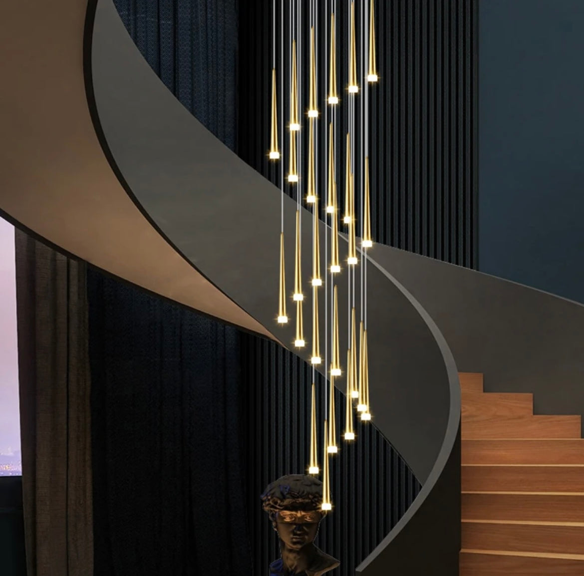 Gold LED chandelier with tapered design, perfect for staircase lighting