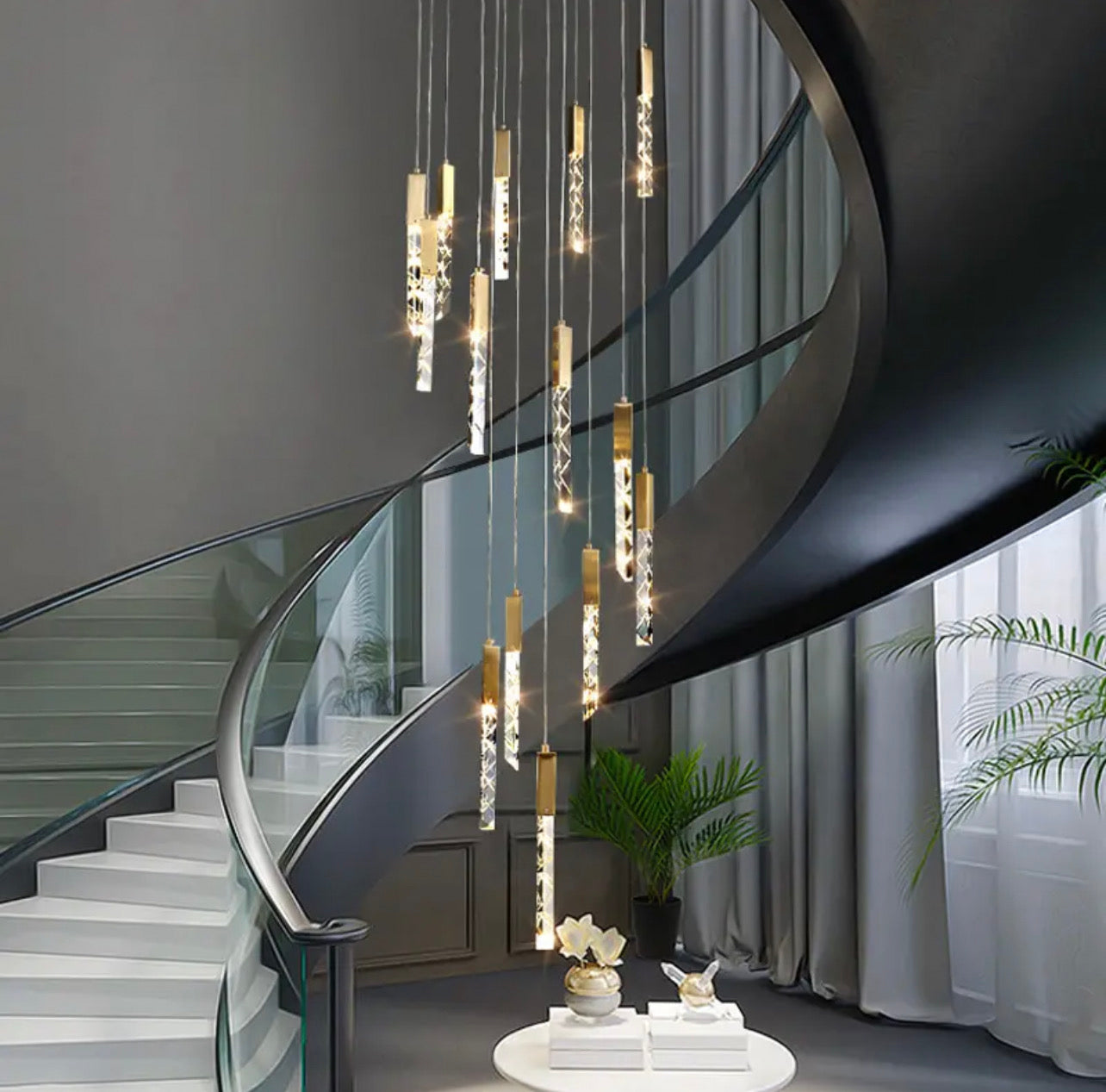 gold & crystal hanging light for staircase