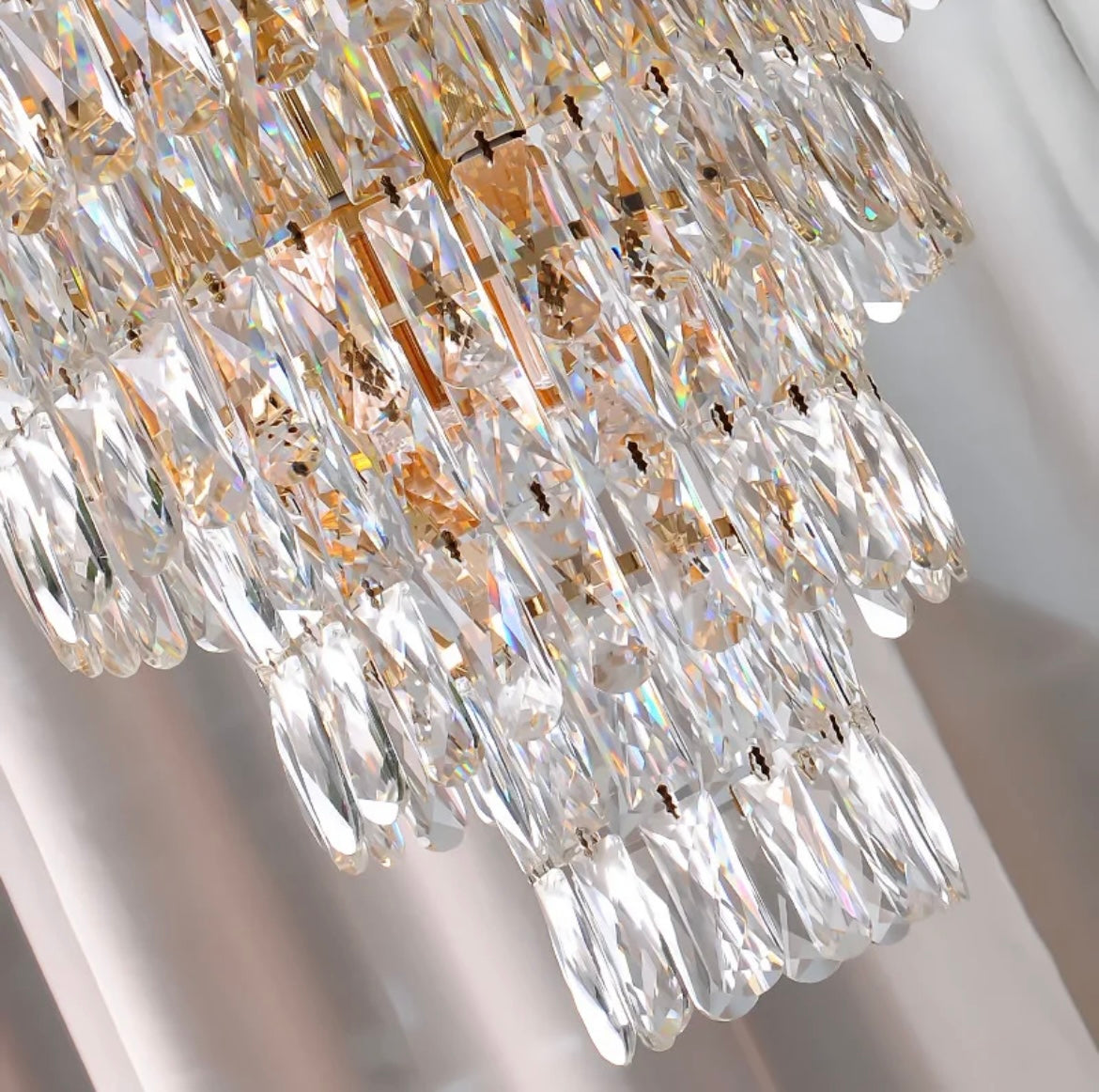 Luxury staircase chandelier with sparkling crystal details