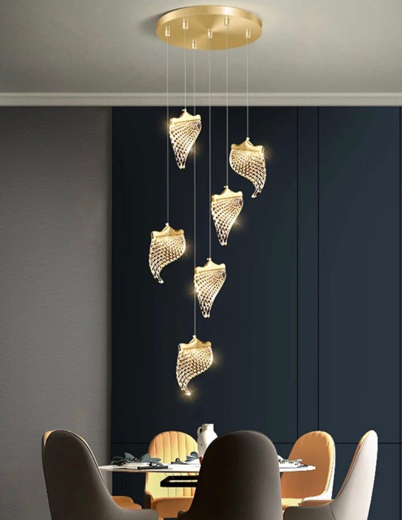 LED-compatible gold scaled chandelier enhancing contemporary home decor