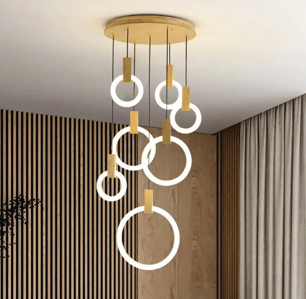 LED hanging ring chandelier illuminating a stylish rooms