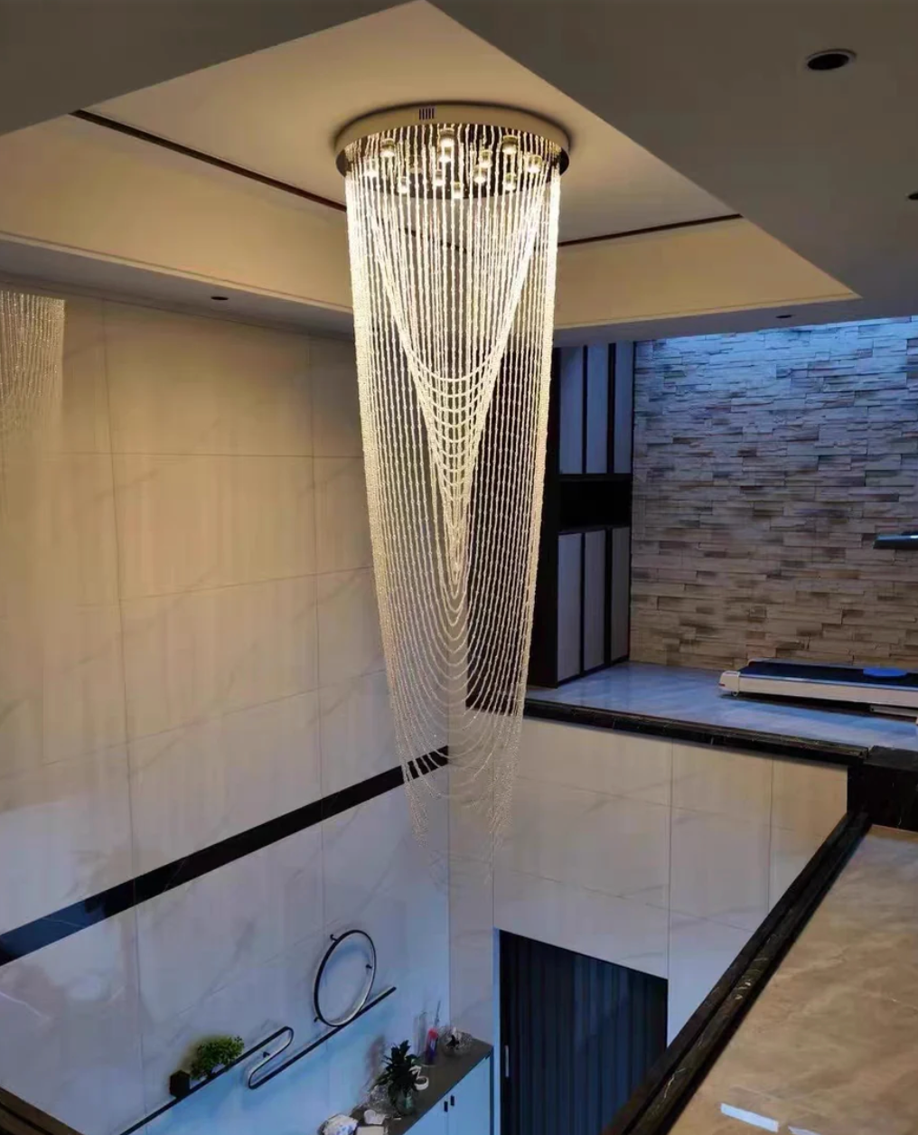 extra long chandelier for staircase in hallway with high ceilings