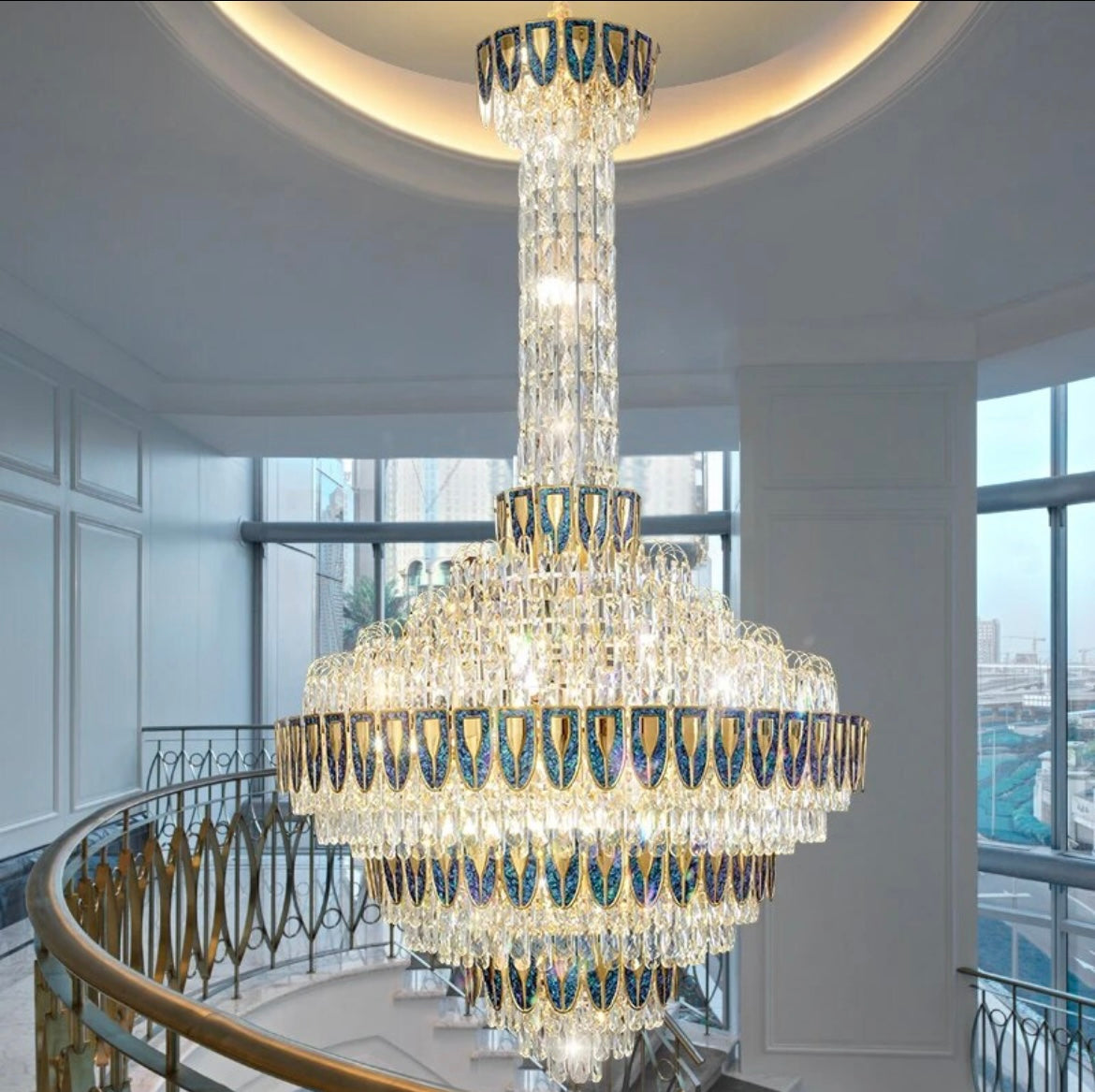 Luxury slim villa chandelier featuring blue-infused glass elements