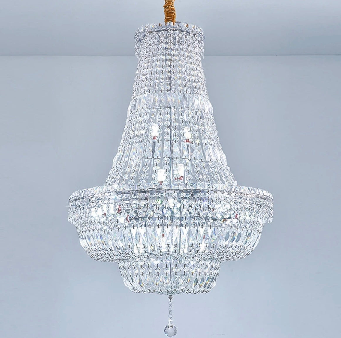 Modern crystal chandelier adding elegance to a dining room