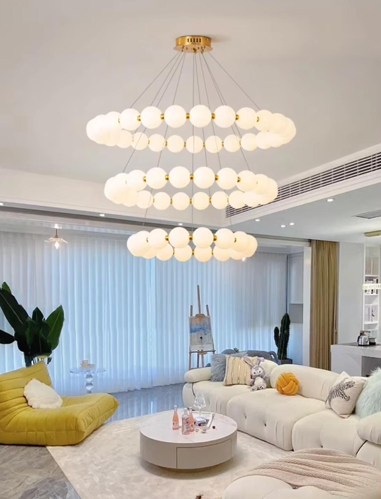 Lustre Pearl Design Pendant Light illuminating a modern living room