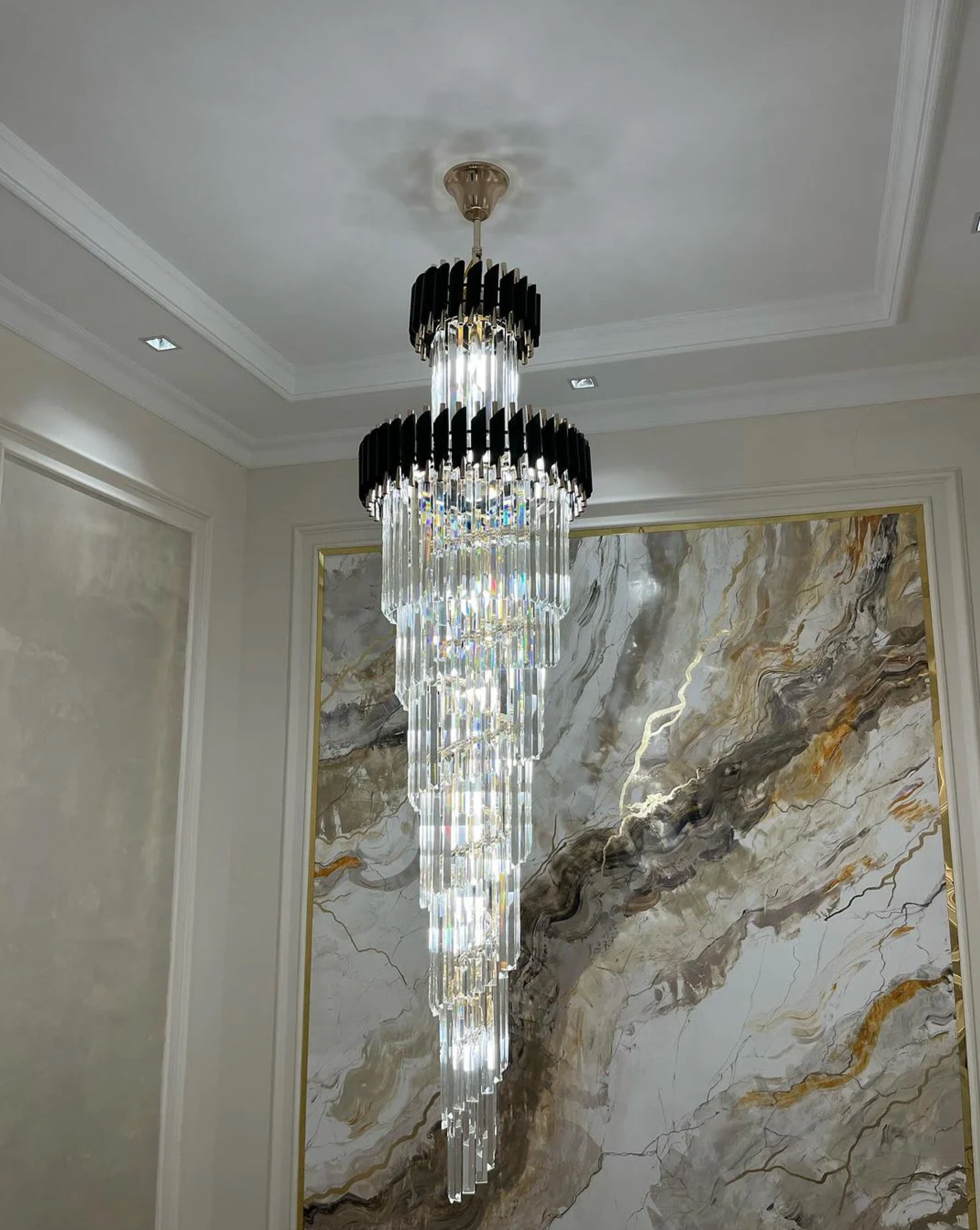 Adjustable height crystal chandelier for large rooms