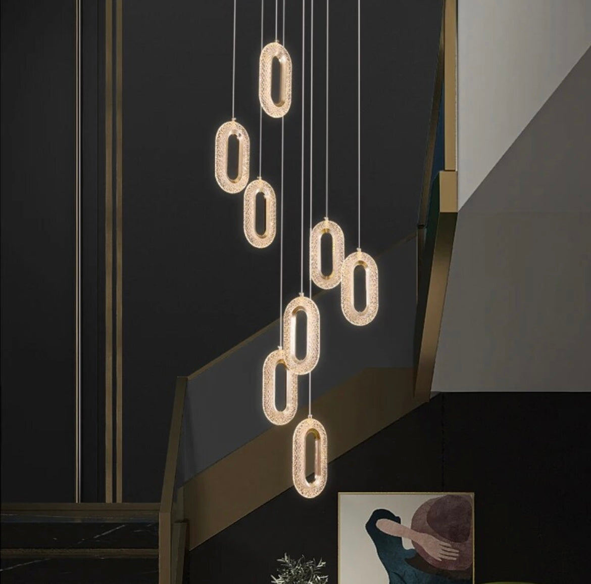 gold hooped luxury staircase chandelier